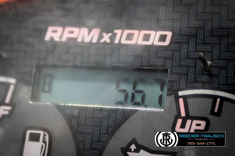 Slide: The Image of Digital RPM gauge displaying 567 RPM on a 2023 Godfrey SW2286C boat. - 33