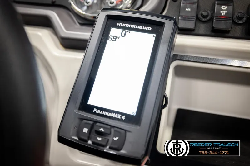 Slide: The Image of Humminbird PiranhaMAX 4 fish finder on 2023 Godfrey SW2286C boat dashboard. - 35