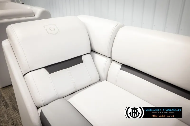 Slide: The Image of 2023 Godfrey SW2286C boat seat with white upholstery and logo detail. - 41