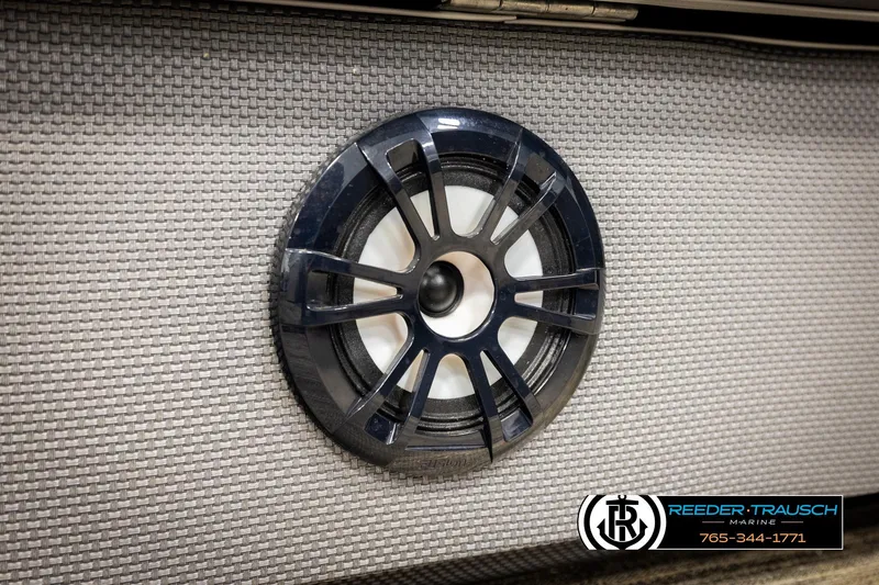 Slide: The Image of Speaker on a 2023 Godfrey SW2286C boat, textured panel background. - 43