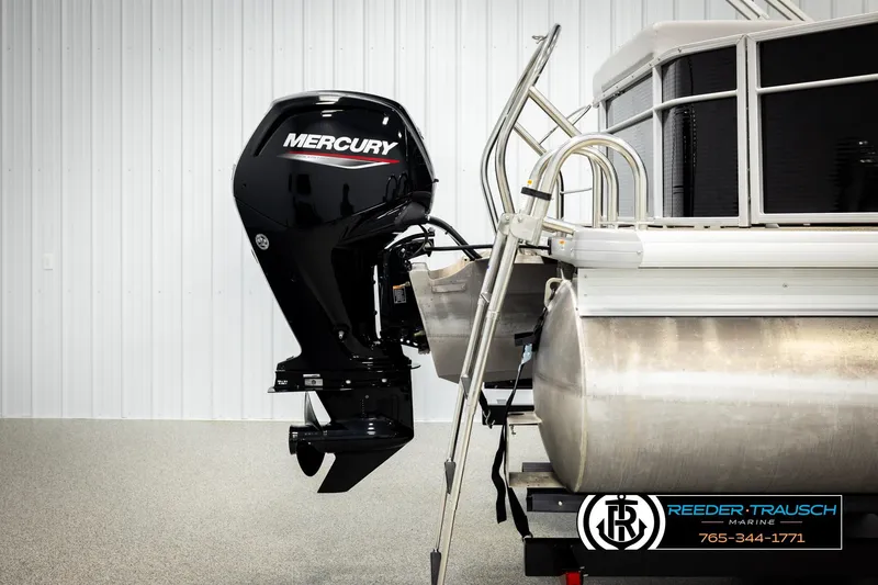 Slide: The Image of 2023 Godfrey SW2286C pontoon boat with Mercury outboard motor in showroom. - 44