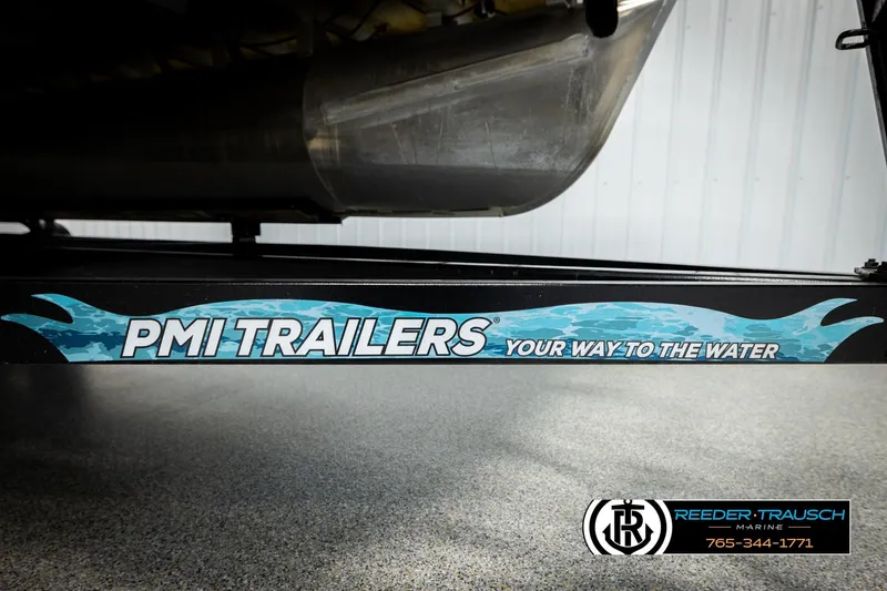 Slide: The Image of PMI Trailers branding on Godfrey SW2286C, 2023 model, with Reeder-Trausch Marine contact. - 48