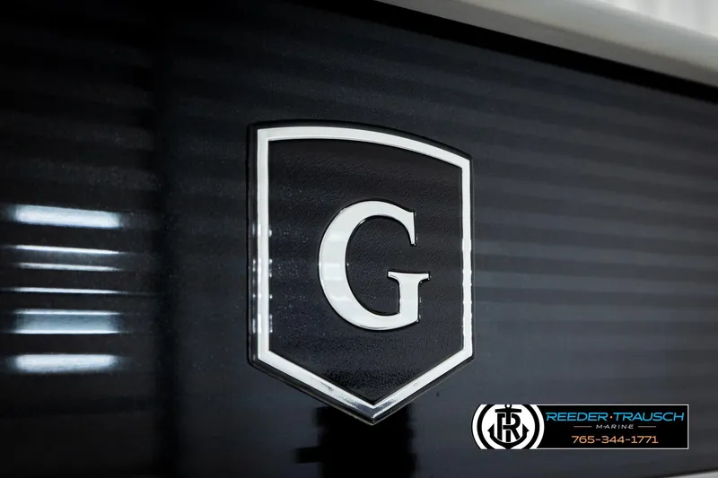 Slide: The Image of 2023 Godfrey SW2286C logo on dark background, Reeder-Trausch Marine branding. - 49