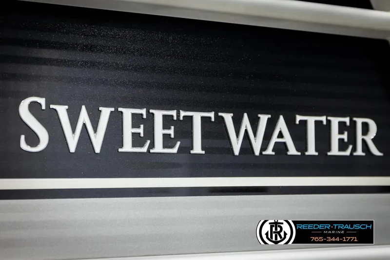 Slide: The Image of Sweetwater logo on 2023 Godfrey SW2286C boat, Reeder-Trausch Marine branding visible. - 50