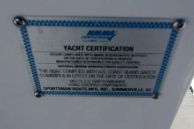 Slide: The Image of Yacht certification plaque for 2025 Sportsman Heritage 261, meeting U.S. Coast Guard safety standards. - 17