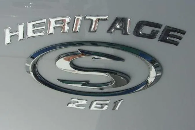 Slide: The Image of 2025 Sportsman Heritage 261 logo with sleek metallic design. - 5