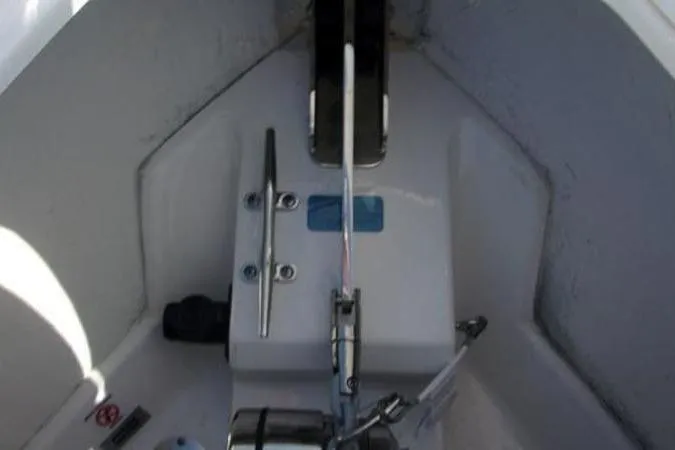 Slide: The Image of 2025 Sportsman Heritage 261 boat interior, featuring anchor and cleat setup. - 9