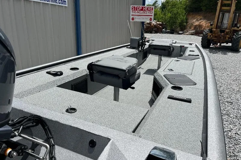 Slide: The Image of 2026 War Eagle 754VS Stick Steer boat with seating and storage compartments. - 6