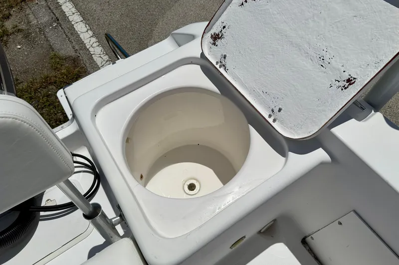 Slide: The Image of Open storage compartment on 2002 Sea Pro 220 Center Console boat. - 30