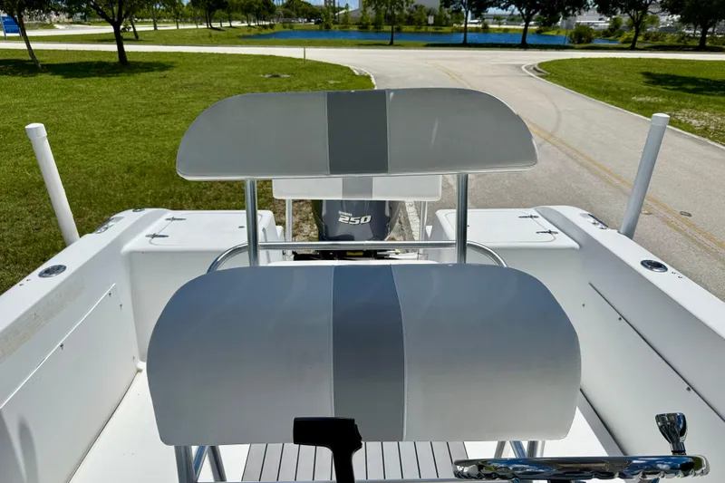 Slide: The Image of 2002 Sea Pro 220 Center Console boat with dual seats and a 250 horsepower engine. - 8