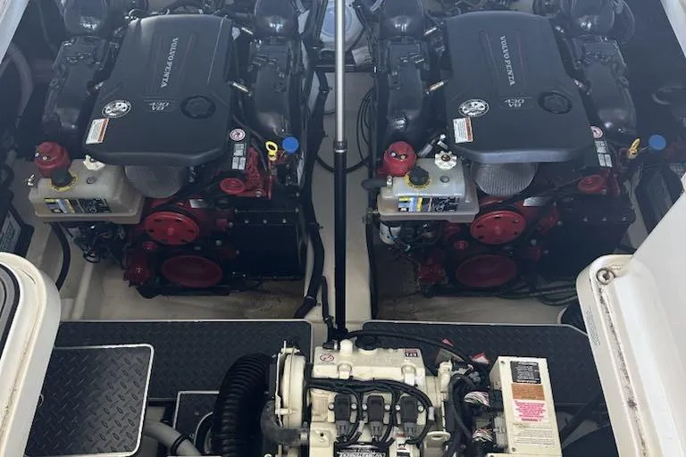 Slide: The Image of Engine compartment of 2020 Formula 330 Crossover Bowrider with dual engines. - 112