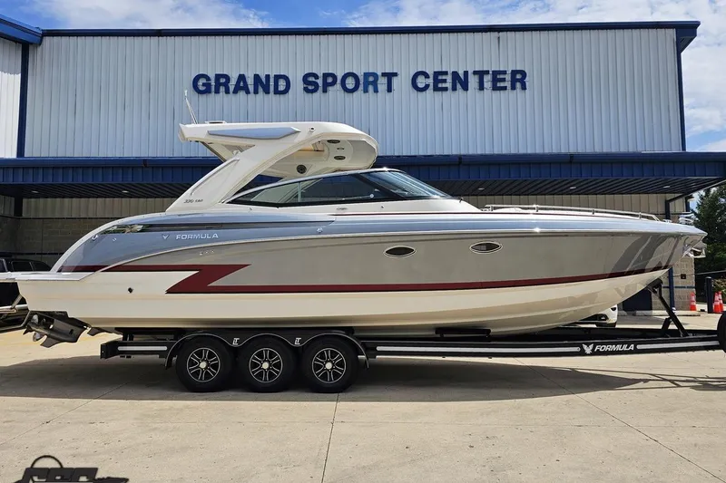 Slide: The Image of 2020 Formula 330 Crossover Bowrider boat on trailer at Grand Sport Center. - 3