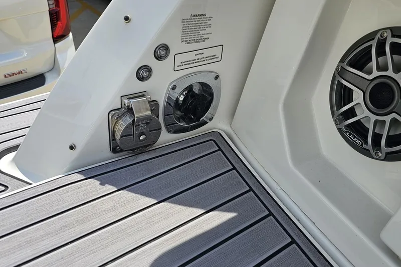 Slide: The Image of 2020 Formula 330 Crossover Bowrider deck with audio system and power connections. - 39