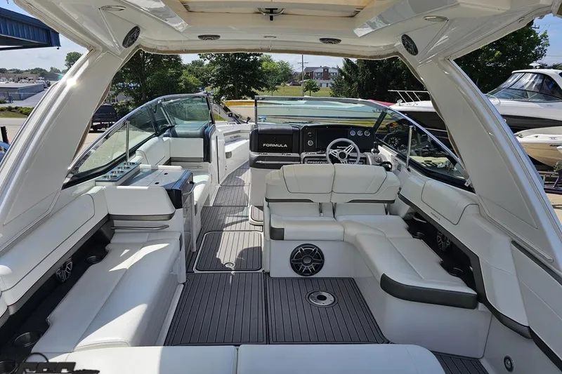 Slide: The Image of 2020 Formula 330 Crossover Bowrider interior with luxurious seating and modern dashboard. - 42