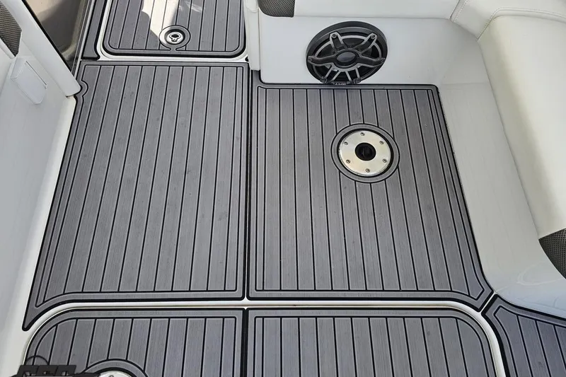 Slide: The Image of 2020 Formula 330 Crossover Bowrider deck with sleek, modern flooring design. - 48