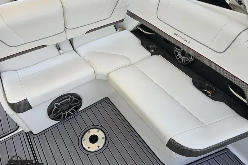 Slide: The Image of Luxurious seating in 2020 Formula 330 Crossover Bowrider with premium speakers and sleek design. - 52