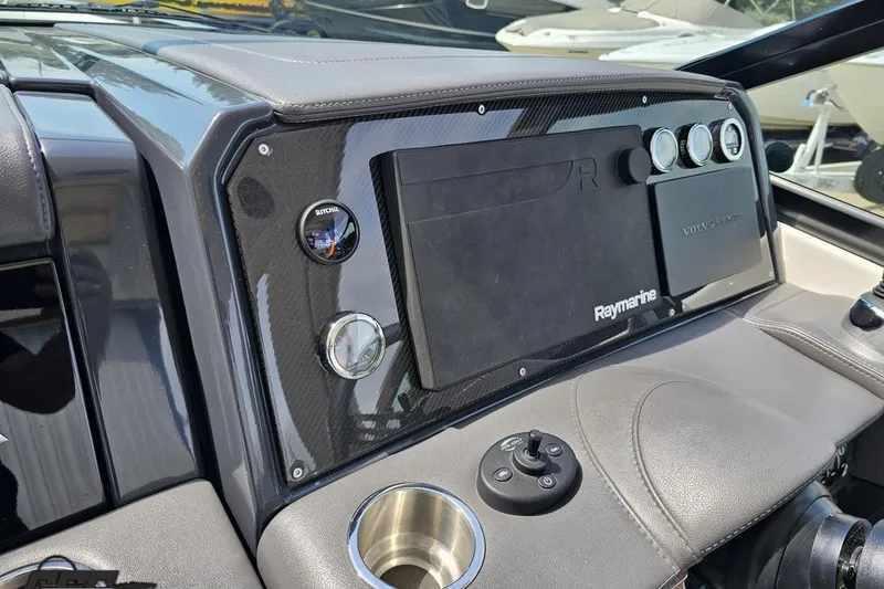 Slide: The Image of Dashboard of 2020 Formula 330 Crossover Bowrider with Raymarine display and controls. - 65