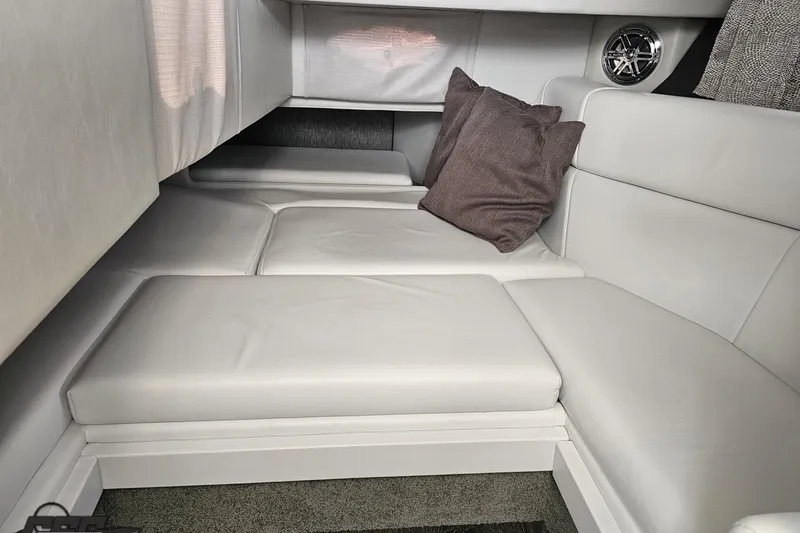 Slide: The Image of 2020 Formula 330 Crossover Bowrider interior with plush seating and cushions. - 74