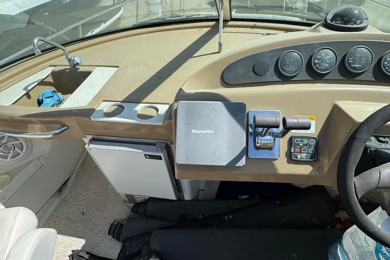 Slide: The Image of 2004 Carver 360 Mariner yacht on stands under a bright blue sky. - 6