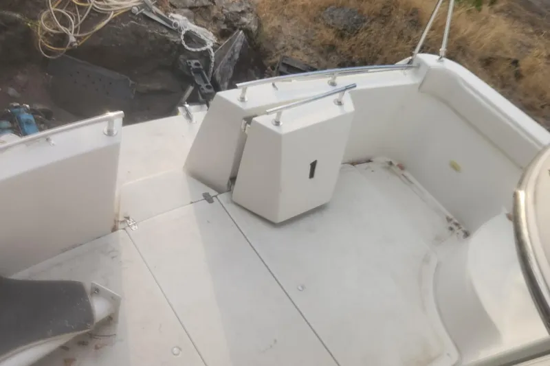 Slide: The Image of 2004 Carver 360 Mariner boat deck with seating and railing. - 62