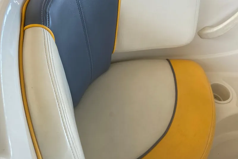 Slide: The Image of 2007 Sea Ray 195 Sport boat seat with yellow and gray accents. - 10