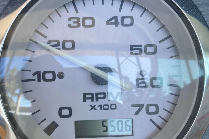 Slide: The Image of Close-up of a 2007 Sea Ray 195 Sport RPM gauge showing 5506 RPM. - 16