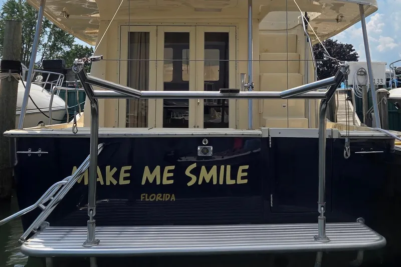 Slide: The Image of 2006 Mainship 40 Trawler named "Make Me Smile" docked in Florida. - 3