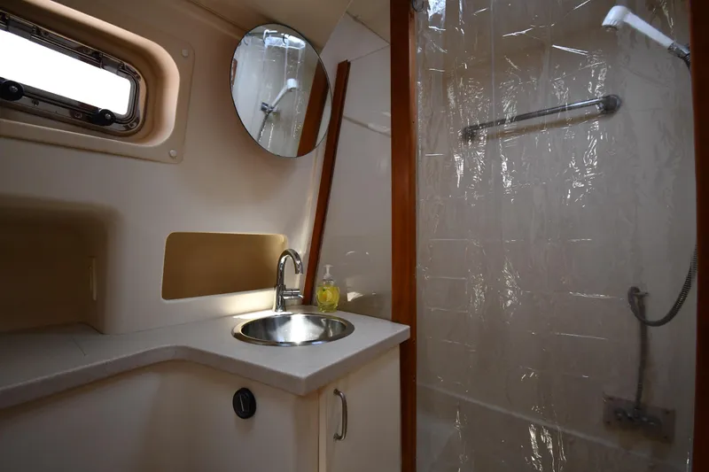 Slide: The Image of Bathroom interior of 2006 Mainship 40 Trawler with sink and shower. - 45