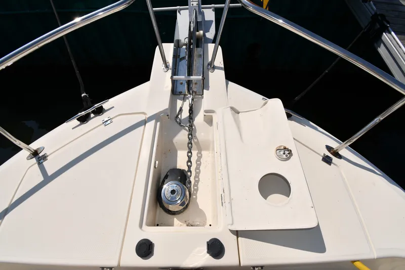 Slide: The Image of 2006 Mainship 40 Trawler bow with anchor chain and deck fittings. - 9