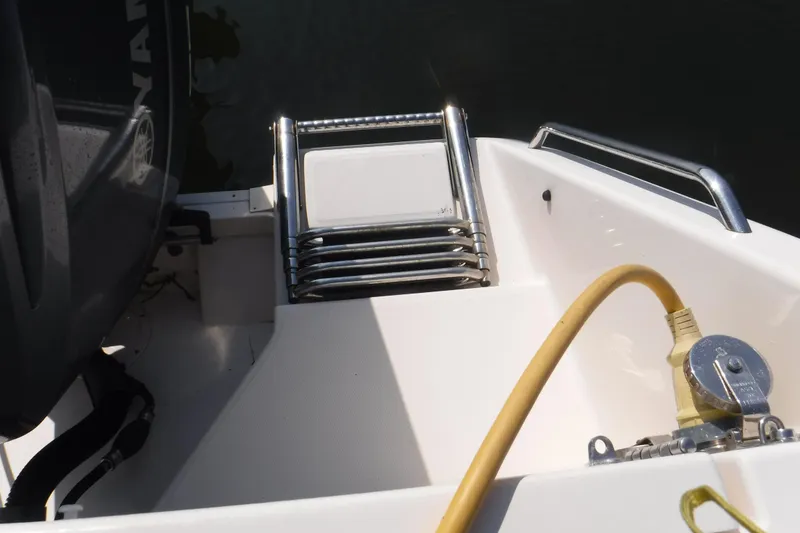 Slide: The Image of 2016 Grady White 355 Freedom boat stern with ladder and power connection. - 12