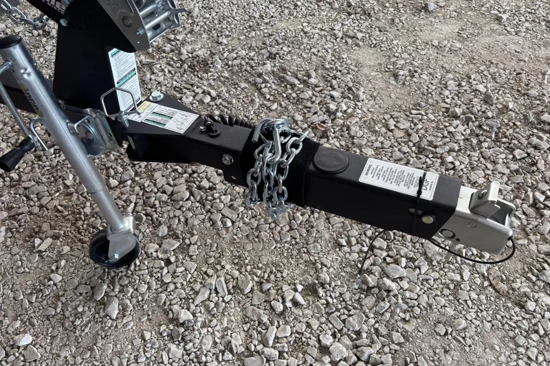 Slide: The Image of Trailer hitch of 2026 Lund 1775 Adventure SS on gravel surface. - 12