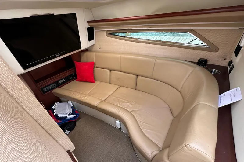 Slide: The Image of Luxurious interior of 2015 Cobalt 336 boat with leather seating and TV. - 23