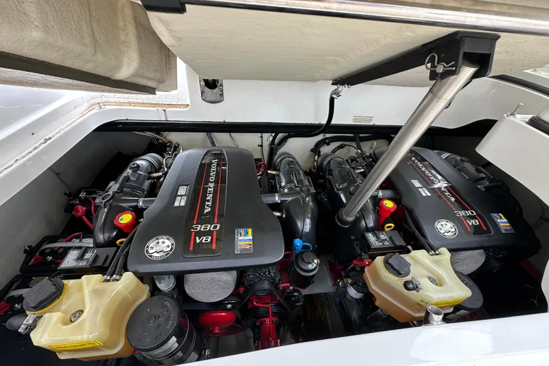 Slide: The Image of 2015 Cobalt 336 boat engine compartment with dual Volvo Penta 380 V8 engines. - 27