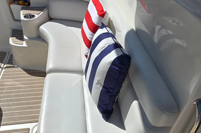 Slide: The Image of Luxurious seating on 2003 Regal Commodore 4260 yacht with striped cushions. - 20