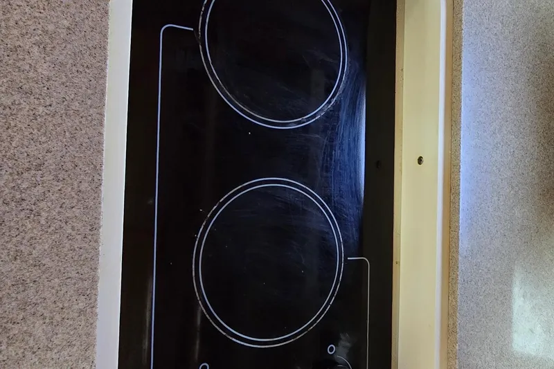 Slide: The Image of Ceramic cooktop on 2003 Regal Commodore 4260 yacht kitchen counter. - 48