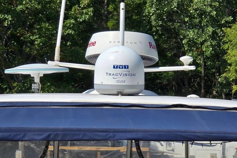 Slide: The Image of Radar and satellite equipment on a 2003 Regal Commodore 4260 boat. - 7