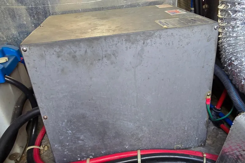 Slide: The Image of Electrical box in a 2003 Regal Commodore 4260 boat engine compartment. - 72