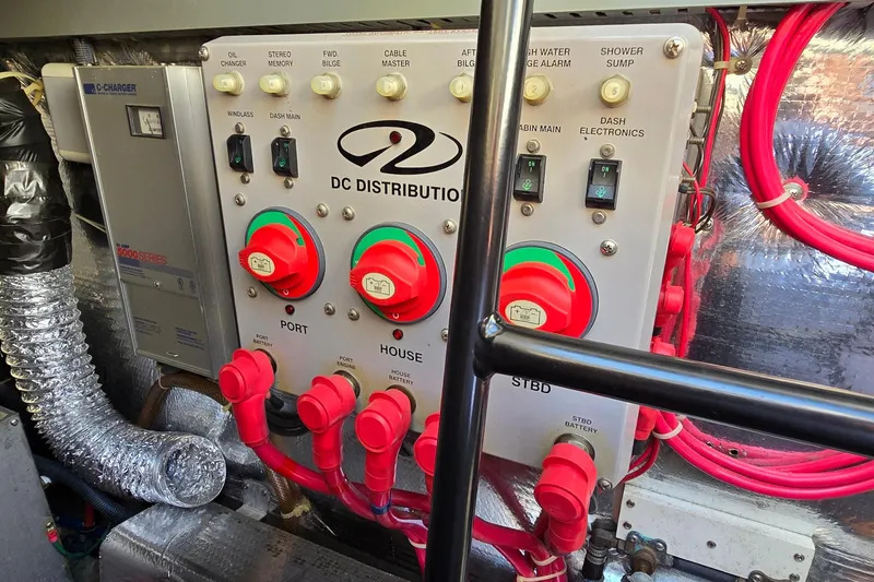 Slide: The Image of DC distribution panel in a 2003 Regal Commodore 4260 boat engine room. - 73