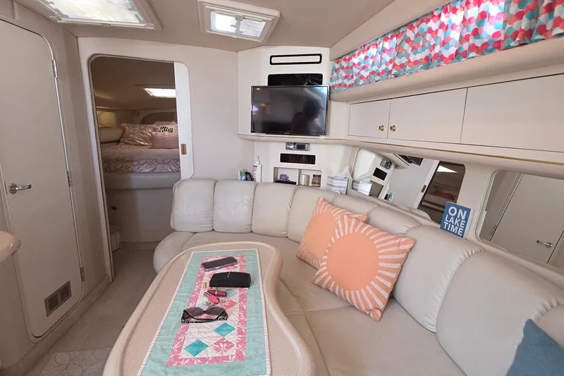 Slide: The Image of Luxurious interior of 1998 Sea Ray 370 Sundancer yacht with cozy seating and decor. - 10