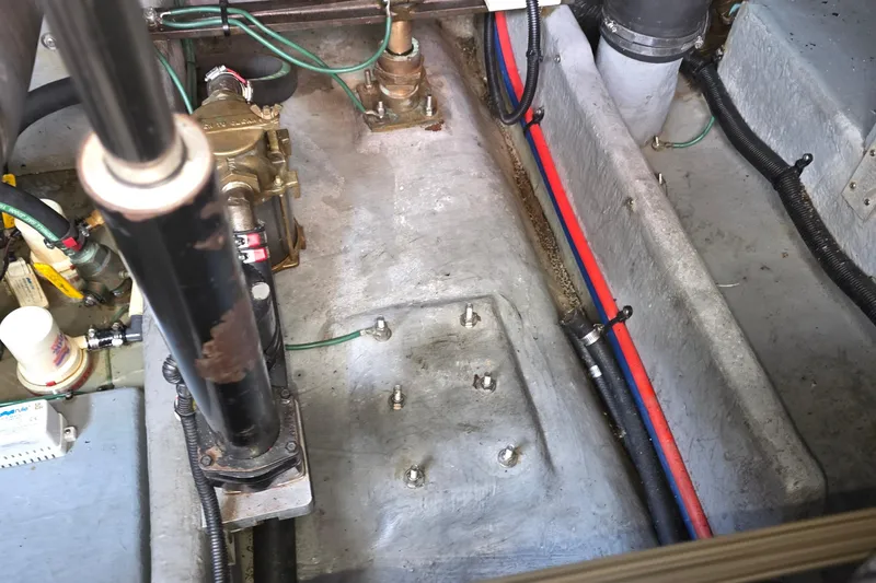 Slide: The Image of Engine compartment of a 1998 Sea Ray 370 Sundancer with visible wiring and components. - 40