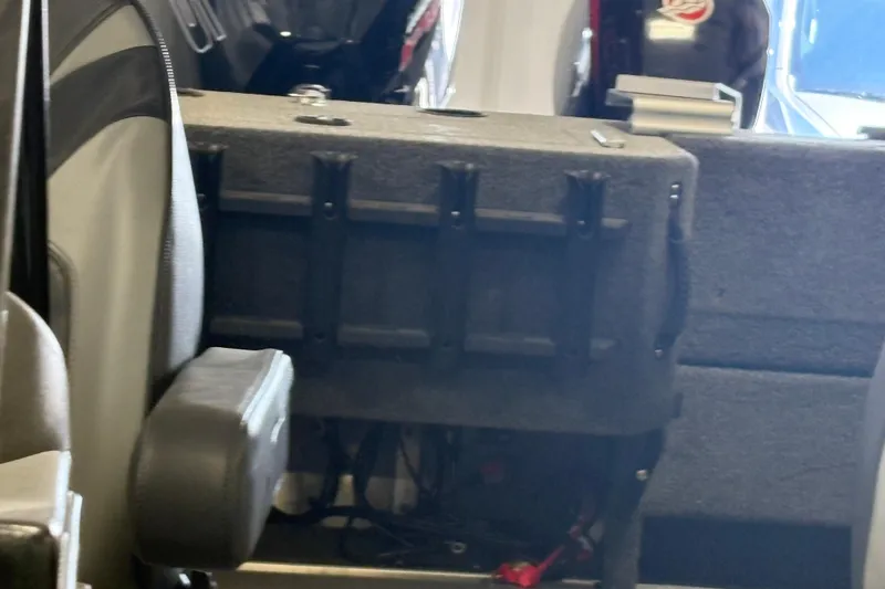 Slide: The Image of Interior view of 2023 Nordlund 2075 FISHERMAN boat, featuring seating and storage compartments. - 11