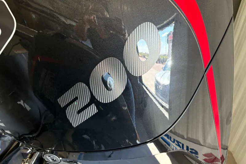 Slide: The Image of Close-up of a 2023 Nordlund 2075 FISHERMAN boat engine with "200" decal. - 3