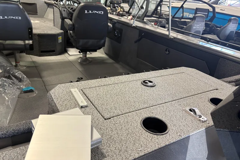 Slide: The Image of Interior of 2023 Nordlund 2075 FISHERMAN boat with seating and storage compartments. - 5