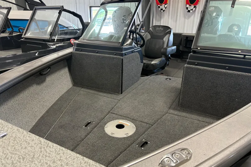 Slide: The Image of 2023 Nordlund 2075 FISHERMAN boat interior with seating and windshield. - 8
