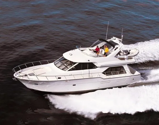 Slide: The Image of Luxurious bedroom in 2001 Bayliner 5288 Pilot House Motoryacht with elegant bedding. - 25