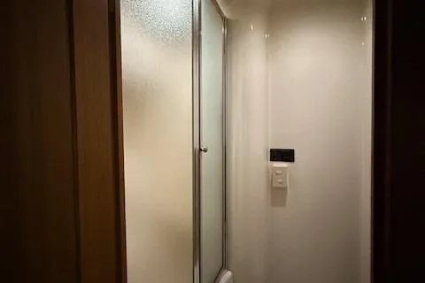 Slide: The Image of Bathroom interior of 2001 Bayliner 5288 Pilot House Motoryacht with shower enclosure. - 27