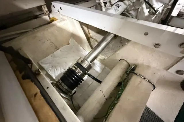 Slide: The Image of Bayliner 5288 Pilot House Motoryacht 2001 engine compartment with visible shaft and components. - 47