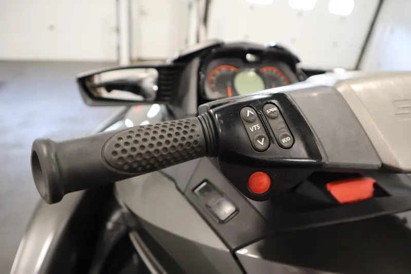 Slide: The Image of Close-up of 2013 Sea-Doo GTX 260 iS Limited handlebar controls. - 15