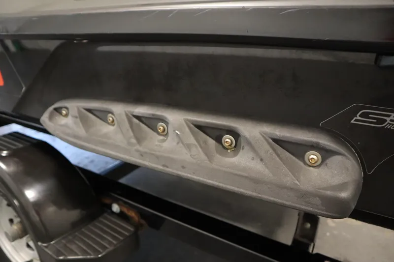 Slide: The Image of 2013 Sea-Doo GTX 260 iS Limited trailer detail, showcasing side panel and wheel. - 25