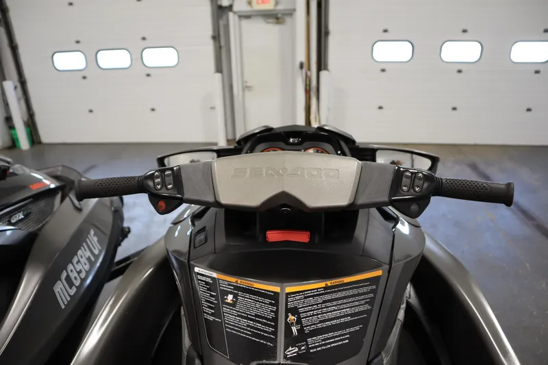 Slide: The Image of 2013 Sea-Doo GTX 260 iS Limited handlebars in a garage setting. - 30